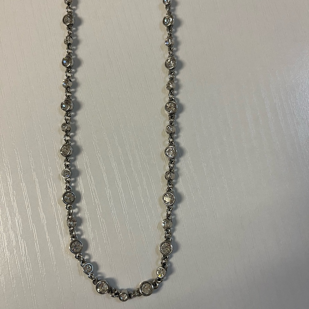 Ann Taylor silver tone long necklace with clear stones